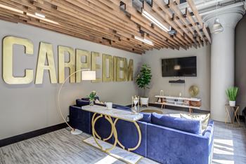 Lobby area with a couch and television